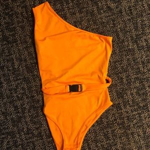 Neon orange one shoulder buckle bodysuit small
